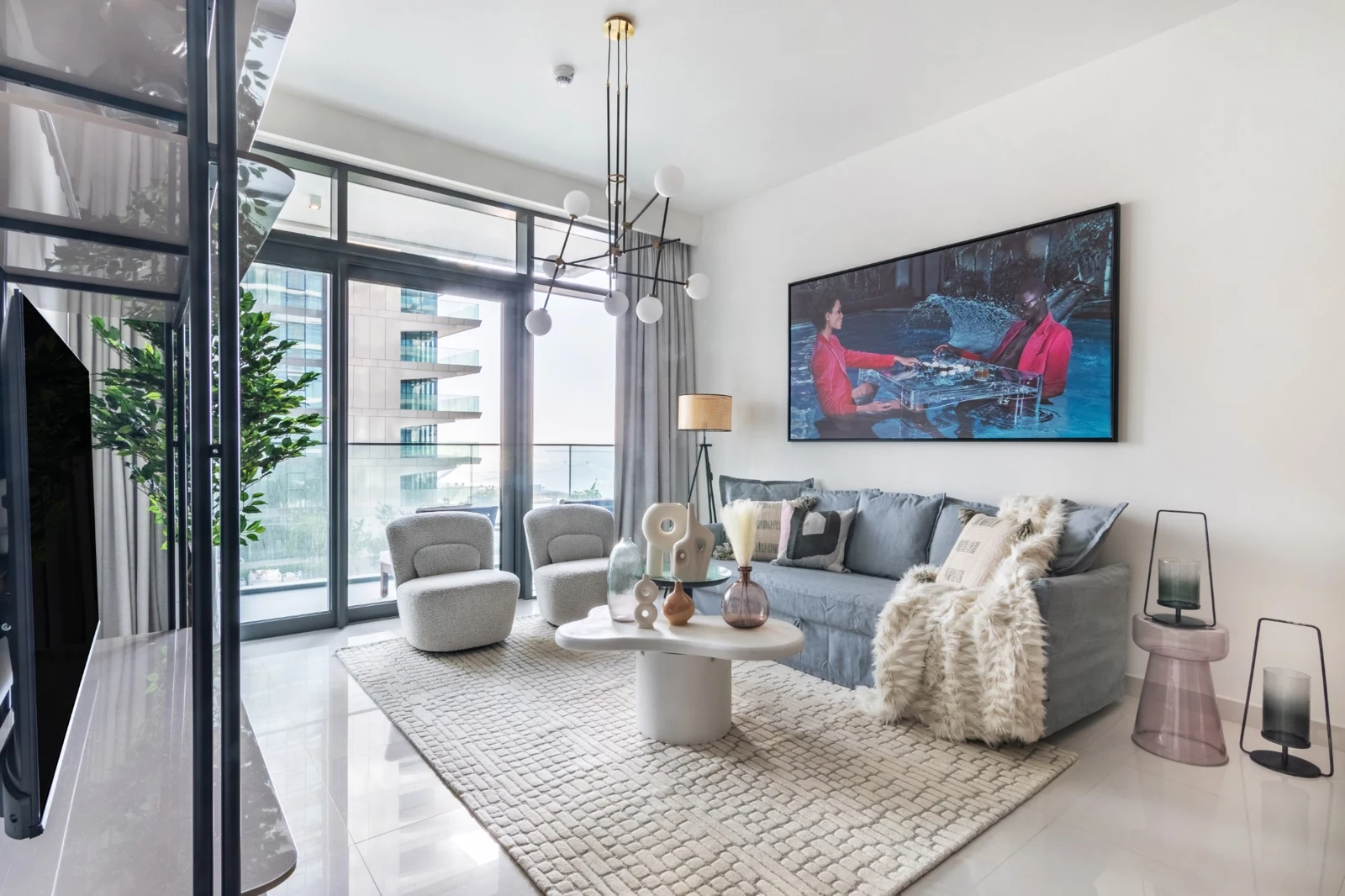Art-filled beachfront living room at Beach Vista 308 — The Smart Concierge