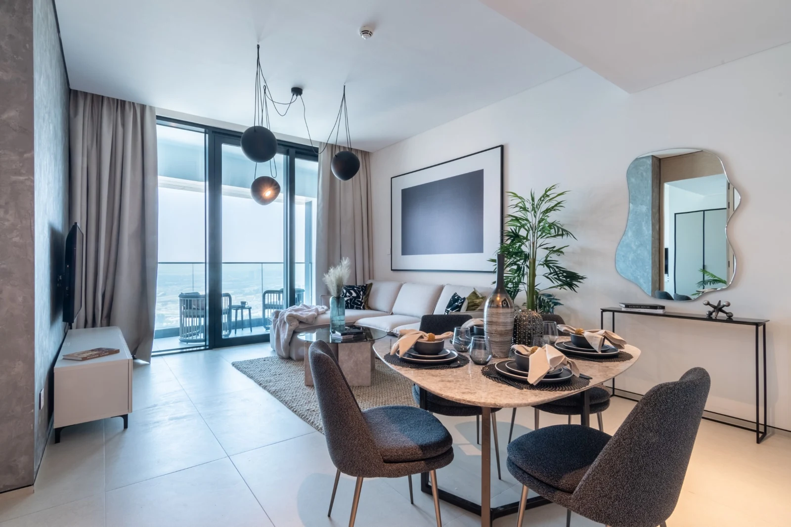 Elegant dining and living room at Address Beach Resort 2706 — The Smart Concierge