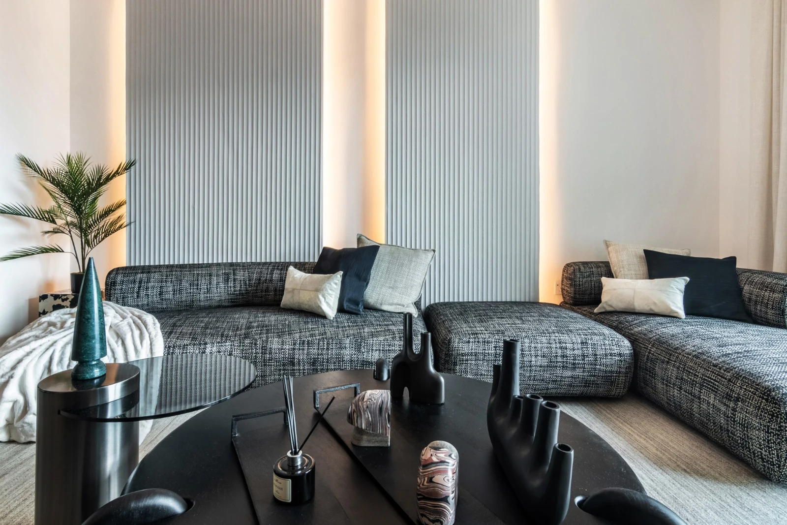 Contemporary dark-blue living room at Downtown Views II 3306 — The Smart Concierge