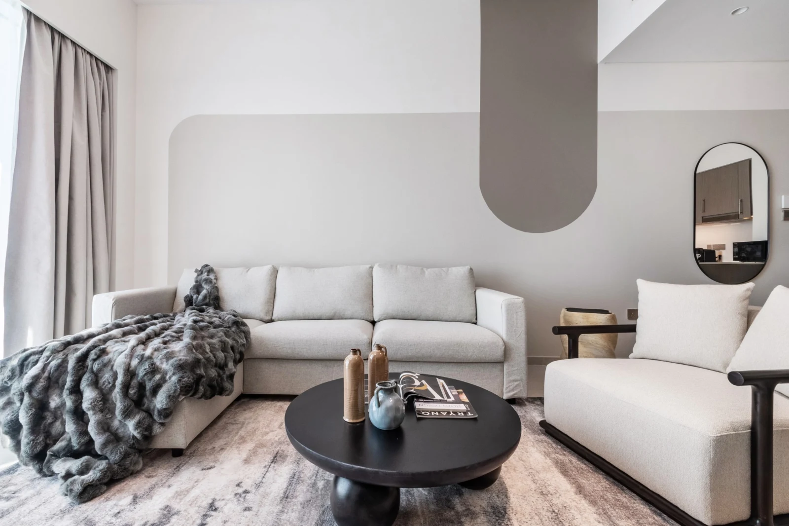 Sculptural furniture and monochrome accents at Grande Signature 4601 — The Smart Concierge